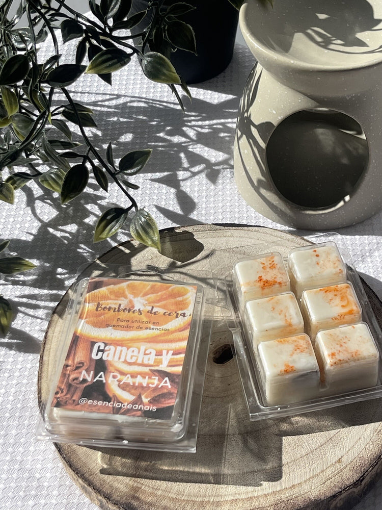Imagen de Bombones de cera canela y naranja.